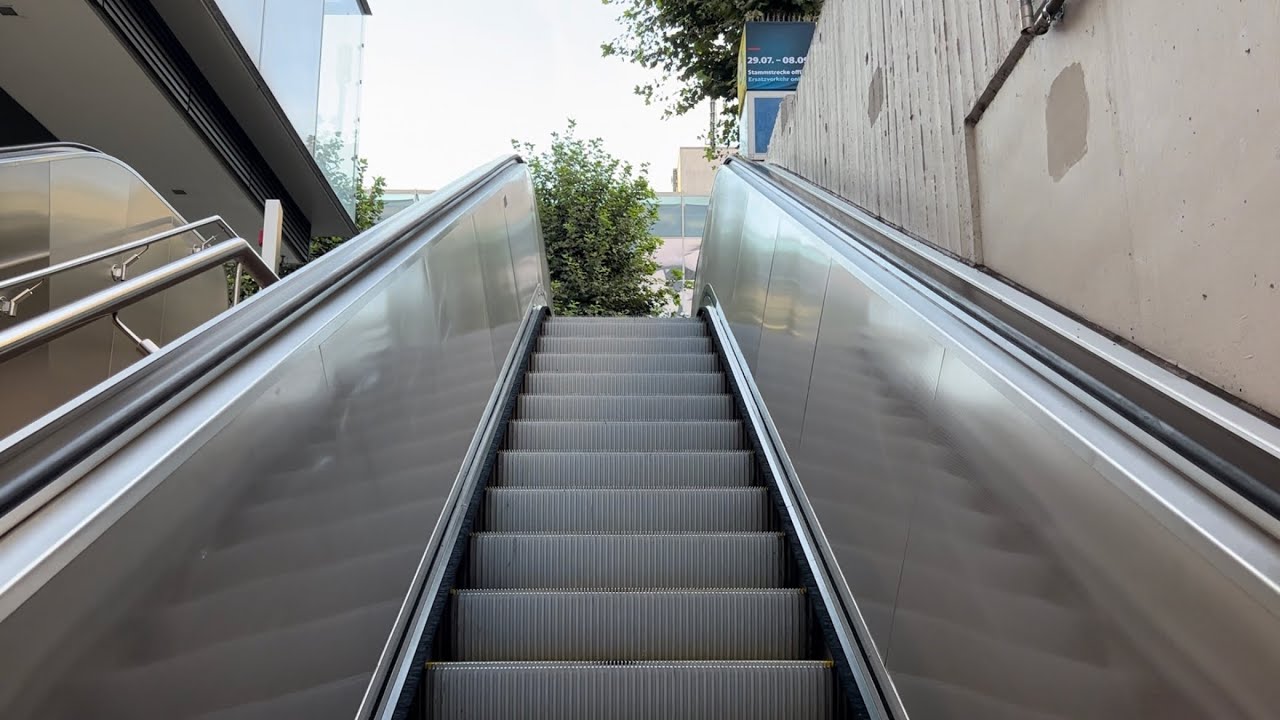 Stuttgart, Germany. 2x Schindler Escalator at a side entrance to Hauptbahnhof Stadtbahn station