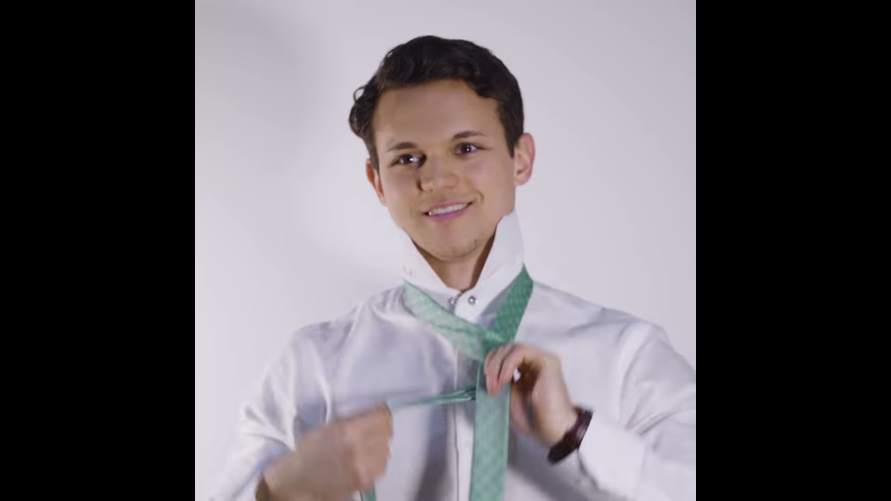 Neck collar too tight for a tie? Use a paper clip as a collar extender