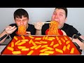 My Brother Tries Spicy Cheesy Rice Cakes For The First Time • MUKBANG