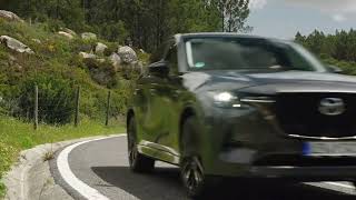 All-new 2022 Mazda CX-60 in Machine Grey Driving in Portugal