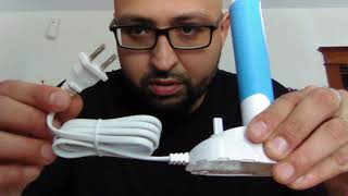 Ghetto unboxing Equate electric toothbrush.