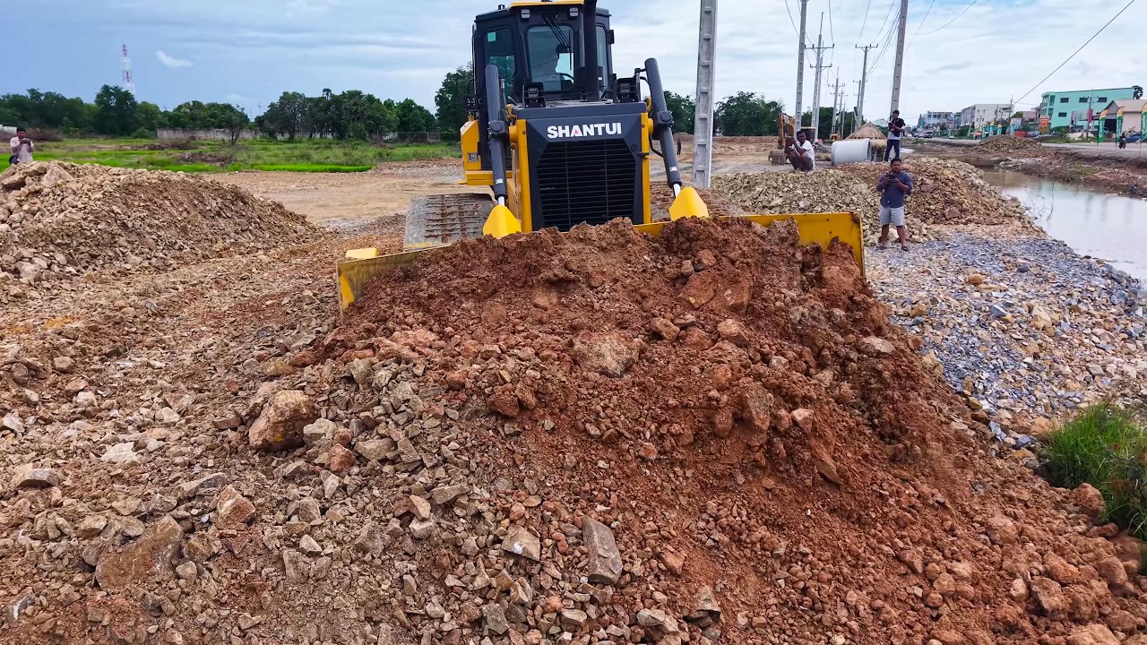 DH17C3 Bulldozer Working with 25 Ton Dump Truck  Flooded Land Road Project