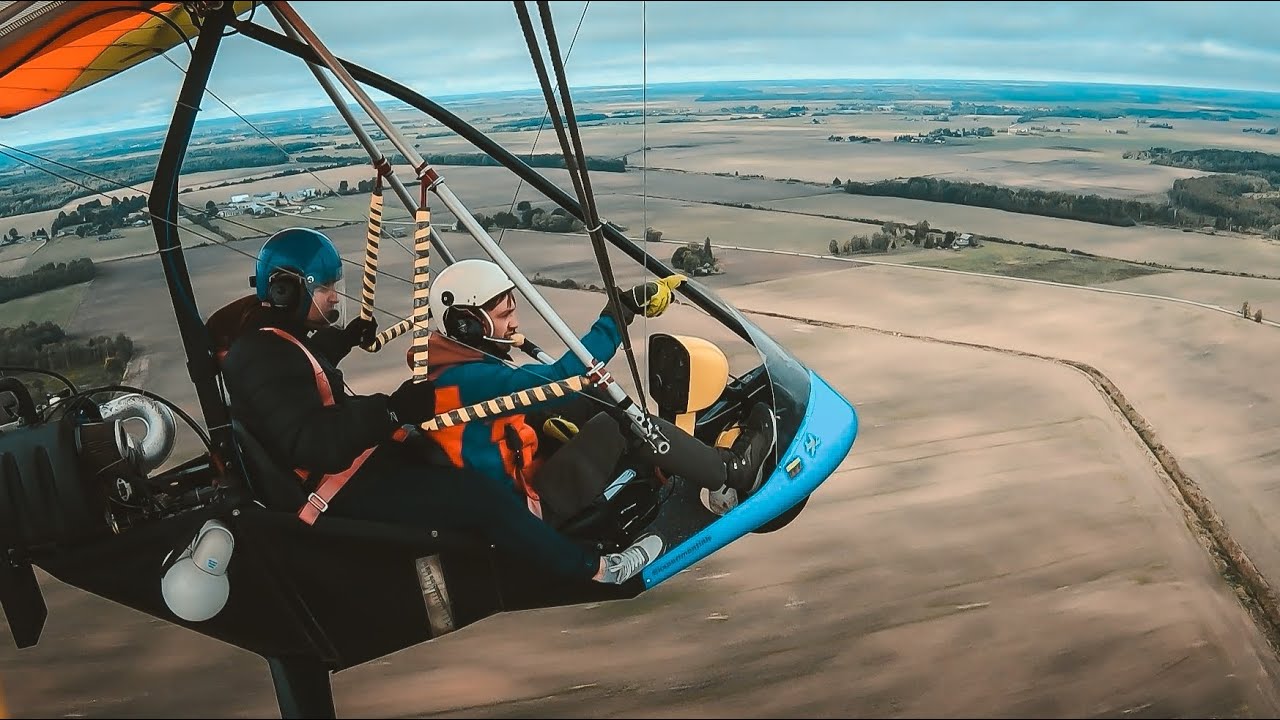 Flights over fields with motorized hang glider / trike YouTube