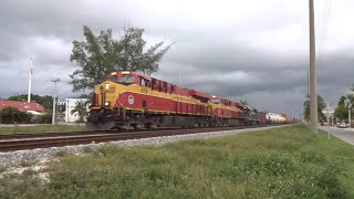 HD - Brightline And FEC RACING towards Ft lauderdale on a stormy afternoon