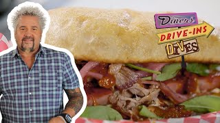 Guy Fieri Takes Down the 'Porkcules' Sandwich | Diners, DriveIns and Dives | Food Network