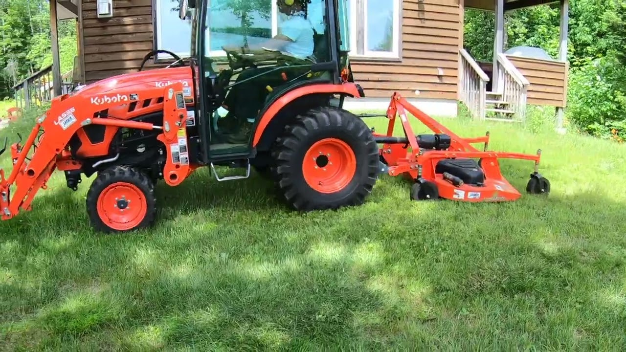 Mowing The Grass Kubota Lx2610 Tractor