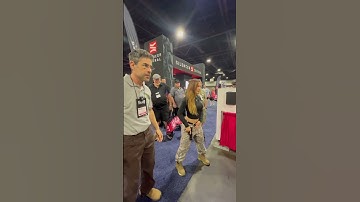 Booth babe at NRA gun show got mad skills
