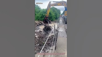 "Flood Rescue Mission! 🌊 Excavator Saves Railway Bridge from Logjam"