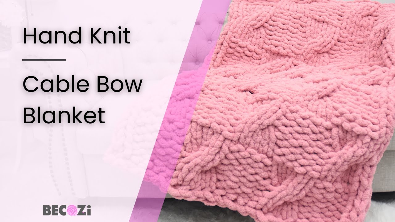 ВЯЗАНОЕ ВРУЧНУЮ ОДЕЯЛО С БАНТОМ ИЗ КОСЫХ ПЛЕТЕН