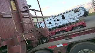 top side of train, caboose, and coal car loaded ready for shipment.