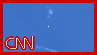 Video appears to show suspected Chinese spy balloon being shot down