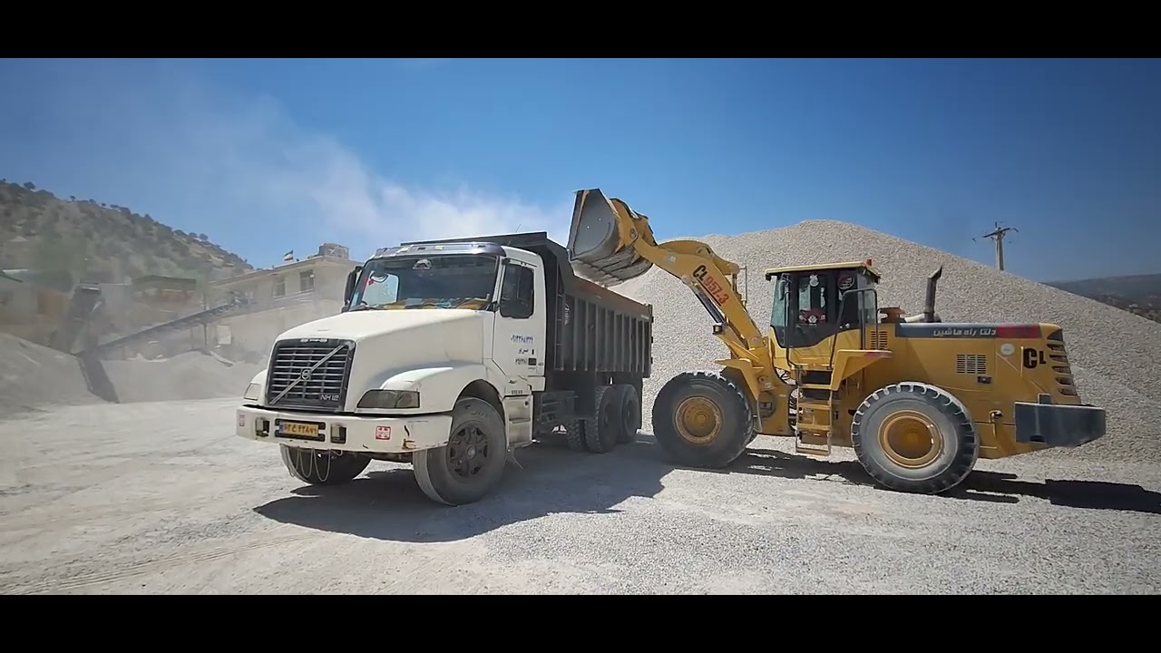 Loading sand into the crusher for nomads