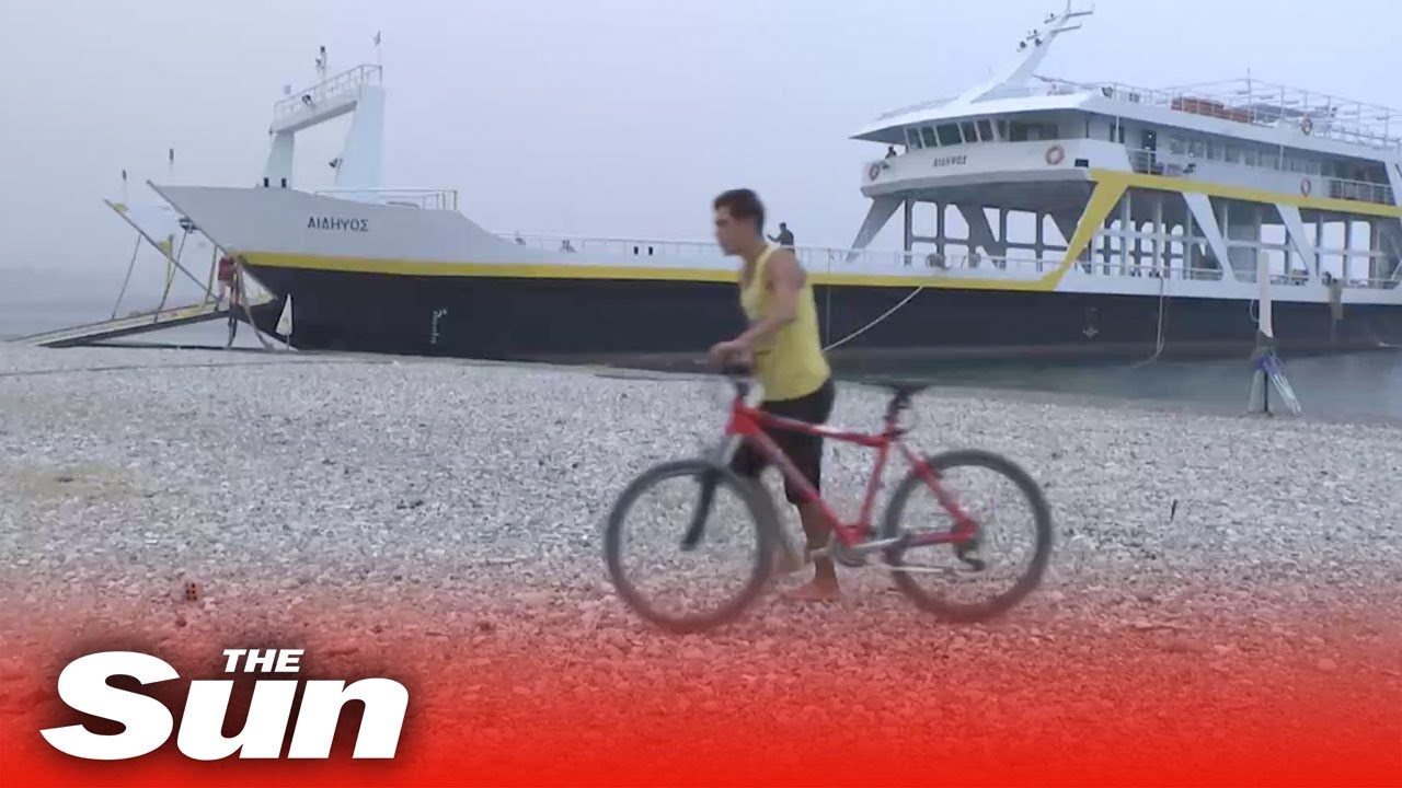 Live: Greece wildfires - Locals & tourists evacuate Evia island