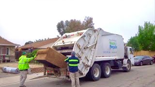 A Very Rare Bridgeport Trooper Rear Loader Packing Bulky Items!
Having filmed every other hauler in SLO County over the past couple years, I always seemed to ignore Paso Robles Waste and Recycle. I just figured that since I had only ever seen Bridgeports from them, Bridgeports were all they ran, with the exception of a newer 520 Automizer and a mini Heil PT1000. When I thought about their standardized fleet of Bridgeports, I only accounted for front and side loaders and completely forgot about the possibility of rear loaders. The funny thing is that I always had a feeling that PR was hiding something cool that I didnt know about, so of course I took a couple drives by the yard to see what I could find. Each time I saw a fleet of what I knew they had plus this McNeilus rear loader.
In fact, I had seen this Trooper several times before I even realized what it was. I had seen it twice while I was driving around North County so I never got a good chance to really look at it. The first time I saw it was in a park on a break, so I took a quick glance at the front as I drove by and dubbed it the McNeilus by the front view of the body. The next time I saw it was from behind on a side road as I was driving down the freeway and thought it was a New Way RL based on the shape of the tailgate - and therefore assumed they had 2 full size rear loaders. It wasnt until about a month ago that a driver from Paso who was a fan of my videos reached out to me via email telling me about this Bridgeport Trooper that they run. At that point, I knew that what I had seen all those times was certainly the Trooper and as you can imagine I felt very stupid.
The Bridgeport Trooper is in no doubt one of the rarest RLs produced in modern times, as the model just simply never took off. I believe it was a custom order to begin with, and even at that, they might have discontinued the design entirely within the past couple of years or so. Despite it being so uncommon, at first glance it is easy to fail to recognize it for what it is. With the body identical to a McNeilus and a tailgate almost identical to a New Ways, at the right angle you might totally pass it off as one or the other similar to what I did. With these older Troopers you really gotta look at the details (i.e. no McNeilus cutout on the front of the body) to correctly identify it.
As you can see this is only the 25th Trooper that Bridgeport built back in 2005, and is likely one of only a handful still in existence. The only other company known to run these is Western Disposal in Colorado, and even then they only have one or 2 as far as I know. If any of you guys know of other companies that run Troopers, please let me know!
Huge thanks and shoutout to Kevin from PRWR for notifying me about this truck and to both him and Wayne for letting me follow them around Paso that morning! And if this truck isnt cool enough, their spare is a Volvo Bridgeport Front Loader with a bucket that I hope to catch them in at some point as well.
PS: Thanks for 20K + subs!! A Very Rare Bridgeport Trooper Rear Loader Packing Bulky Items!