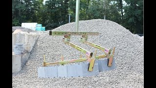 Suction vs. Clamps to pick Retaining Wall Block