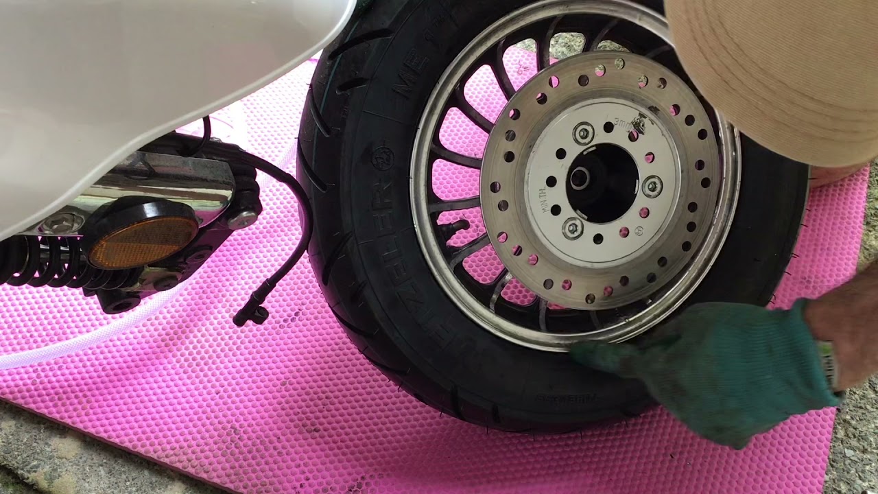 AJS Modena front tyre removal and replacement part 3