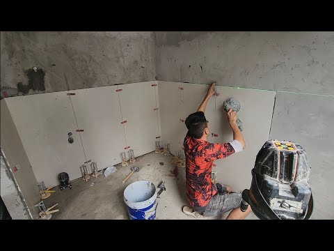 Quá trình ốp chuẩn 99% gạch tường 60x120 ốp đứng hoàng thiện 1 phòng toilet nhà dân quận 9 Sài Gòn 