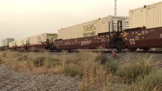 BNSF 5902 Leads Northbound intermodal train and BNSF 6559 Leads Northbound stack train blue cut CA