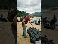 Cleaning up rubbish on the river bank. Love your environment!