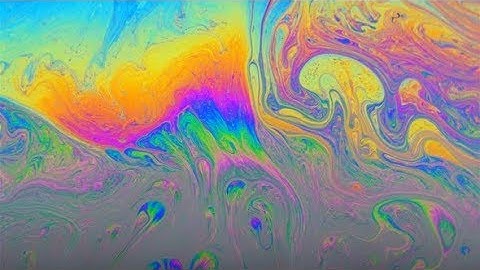 Multi-colored Iris of a Soap Bubble in Motion | Stock Footage - Videohive