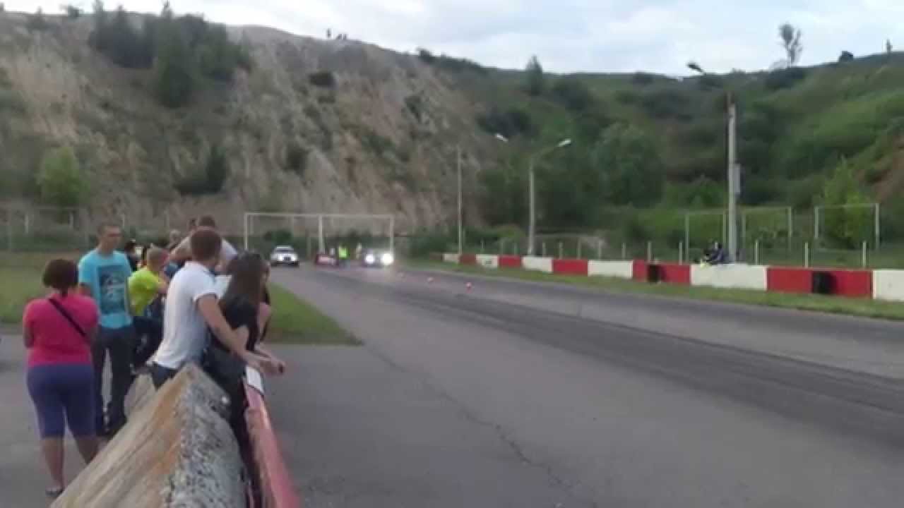 w124 twincharger@1.0bar vs Megane RS stage II 1/4mile run