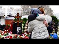 Alexei Navalny supporters lay flowers at Moscow grave