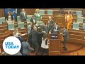Lawmakers throw down on parliament floor  usa today