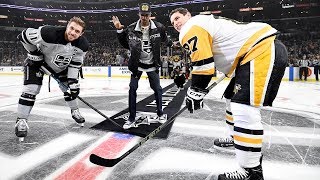 Rapper Snoop Dogg attends an NHL hockey game between Los Angeles