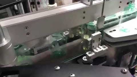 front and back labeling machine with oval bottle device