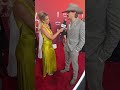 Tucker Wetmore Dances With Katie Austin On The ACM Awards Red Carpet