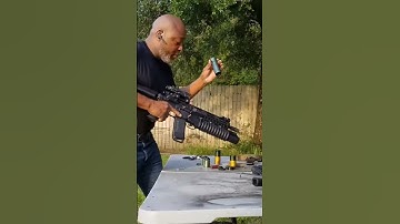SHOOTING A 40MM BUCKSHOT ROUND OUT OF MY 40MM GRENADE LAUNCHER #army #marines #airforce #navy