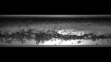 Horizontal Two-Phase R-123 Pseudo-Slug Flow: V008L07-2.mpg