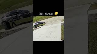 Wind Defeats Kid Pushing The Trash Bin