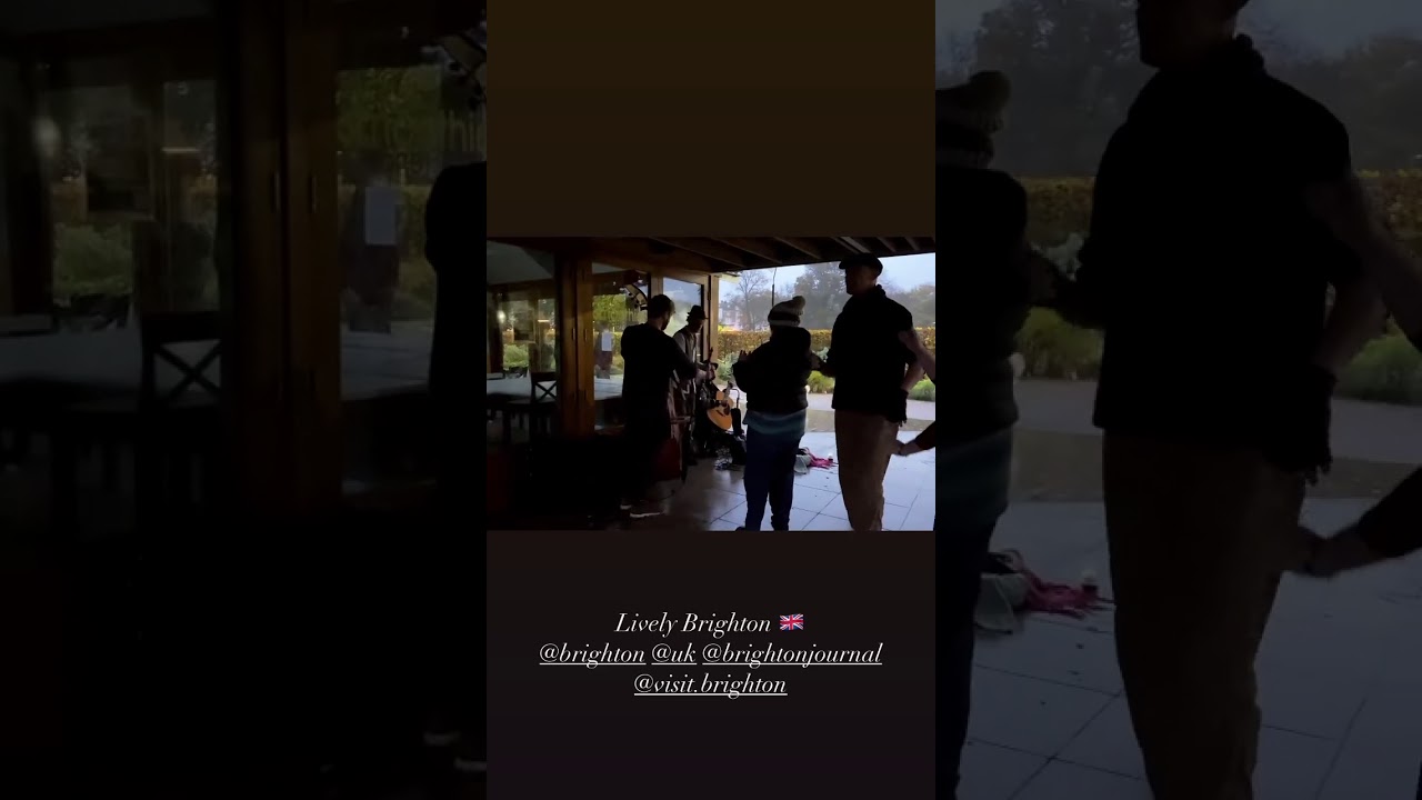 Brighton Live music and dance of rainy Halloween. Brighton, UK.