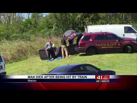 Man dies after being hit by train - YouTube