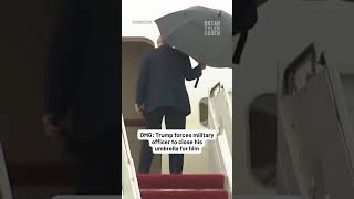 OMG: Trump forces military officer to close his umbrella for him