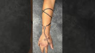 Chain on hand tattoo design.