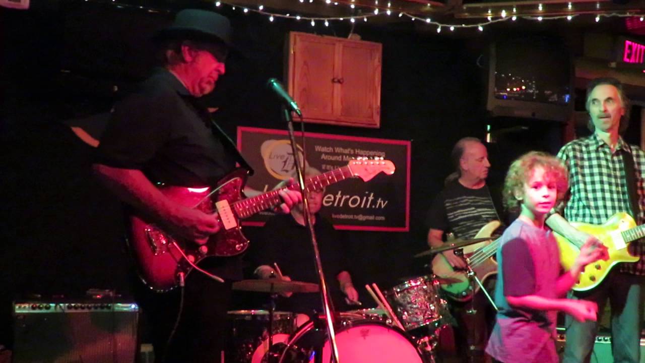 Mighty Michael on harmonica with JIm McCarty and Kenny Parker 