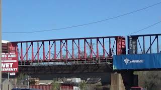 CPKC 118 intermodal stack train meets CN freight at Islington & Steeles.
