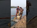 Scooping Sand from the River: A Look into Traditional Labor