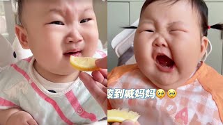 Baby eat lemon.So acidic!! Cute baby moments mix.
