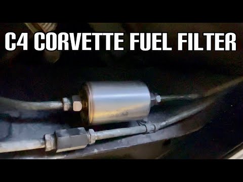 Vídeo: Onde está o filtro de combustível em um Corvette 1986?