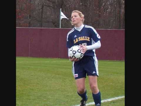 La Salle Explorers Women's Soccer had four shutouts in the early part of the '04 season, quickly surpassing their '03 win total (3). It was a whole new ball game for La Salle defense under the coaching of Paul Royal and Dan Mannella. As of Oct. 10, the Explorers were nonetheless in dire need of wins, with a 1-4 conf. record and six games left. The Explorers first took on Temple and St. Joe's, both on the road. La Salle picked up two wins by 3-0 scores. The Explorers continued to make magic happen on the road, shutting out the team with the 2nd best record in the conference (Rhode Island). Having regained their .500 record and confidence along with it, La Salle furthered their chances by beating UMass in come from behind fashion. A long distance shot by Kelly Lyons careened squarely into the net in the 72nd minute to tie the game, followed thereafter by a Shannon Plunkett gamewinner with only 1 :14 left to go in regulation. La Salle could make a fifth seed playoff berth clinch official at home with a win in their final weekend game against Xavier. Xavier scored first, as Nicole Giesting's professional caliber flip-and-throw-in maneuver was too much for Explorer GK Schamberger to surpass. Giesting already had a team leading three assists on the season, and she notched another one at La Salle's expense. Laura Giesting scored a goal, Nicole Giesting got the assist. La Salle defense tightened up, just as they had all season long, and the Explorers got on the board in the 2nd <b>...</b>