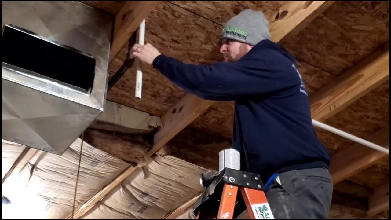 Draining a high efficient furnace 96 to the outdoors with a heat tape