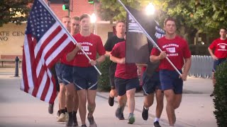 OU ROTC members honoring prisoners of war and those missing in action with run across campus