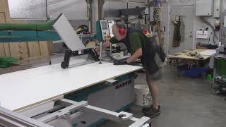 Handling and cutting sheet goods on sliding tablesaw