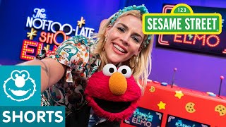 Busy Philipps Gets Dressed for Winter! | The Not-Too-Late Show with Elmo