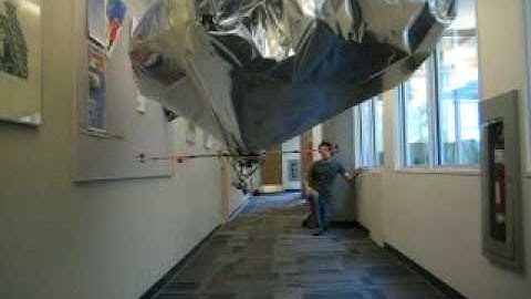 An Autonomous Wall-Following Blimp