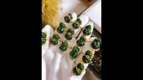 Nhẫn tỳ hưu ngọc cẩm thạch bọc vàng