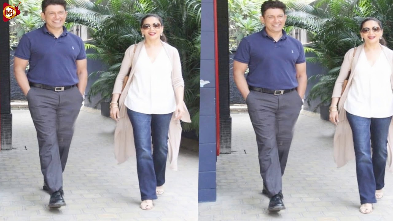 hot actress 90s Madhuri Dixit Nene spotted in the city along with her husband Sriram Nene that is too cute to miss!